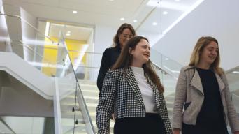 business woman going down stairs